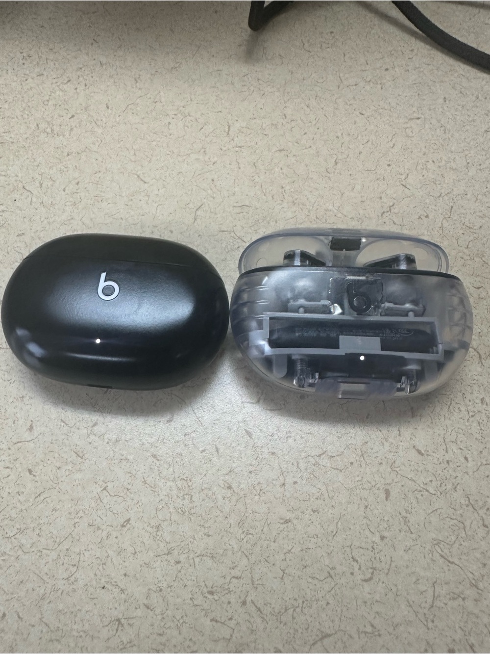 Black Beats Studio Buds and Transparent Beats Studio Buds+